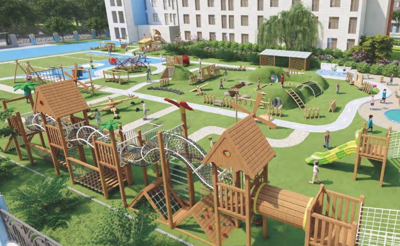 Outdoor playground towers with slides in a green park