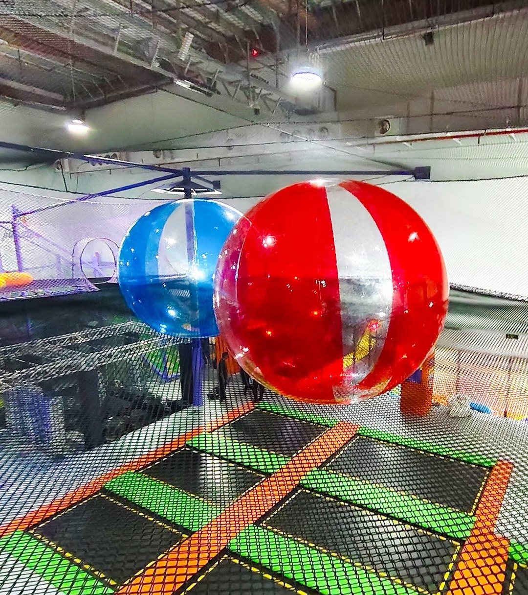 Trampoline courts with ball games in an indoor park