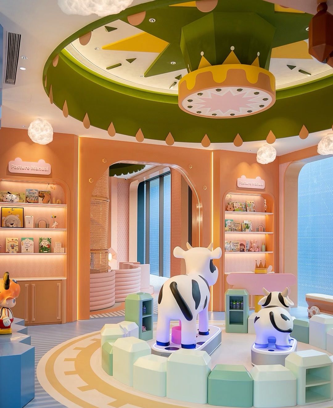 Peach-toned party and play room with a mini carousel
