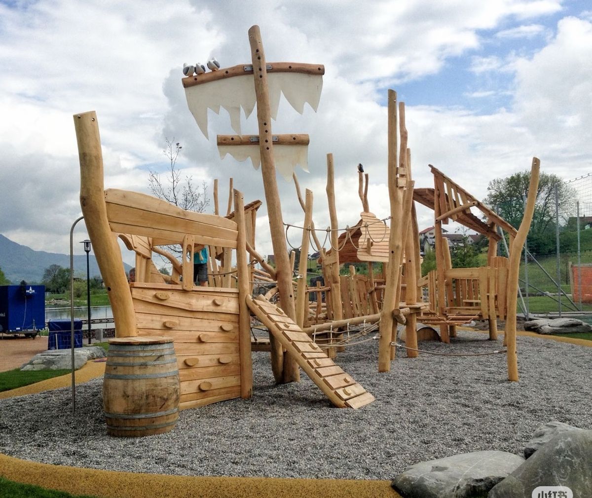 Robinia timber pirate ship playground with masts and climbing nets