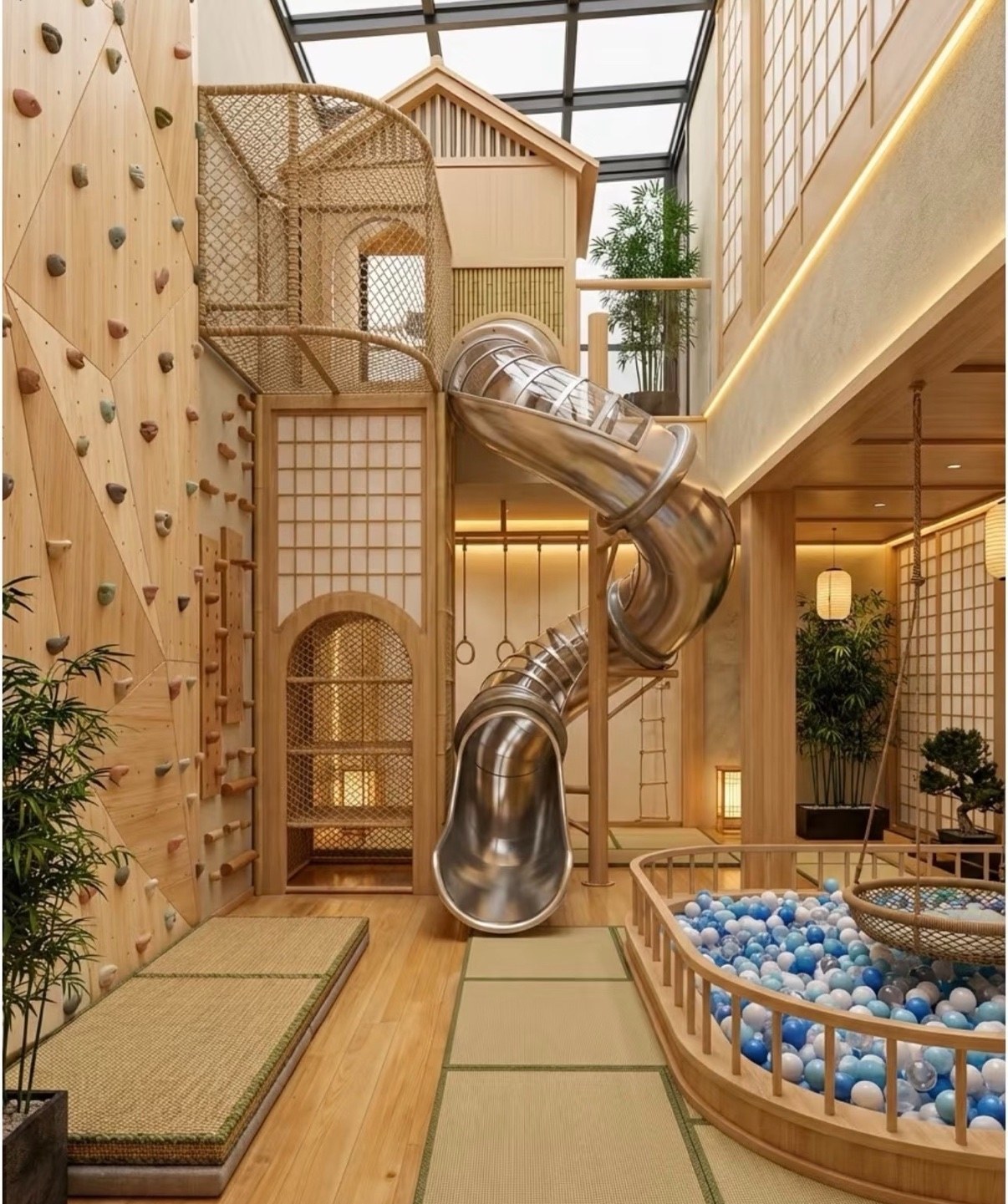Japanese-style timber playhouse interior with steel slide and ball pit