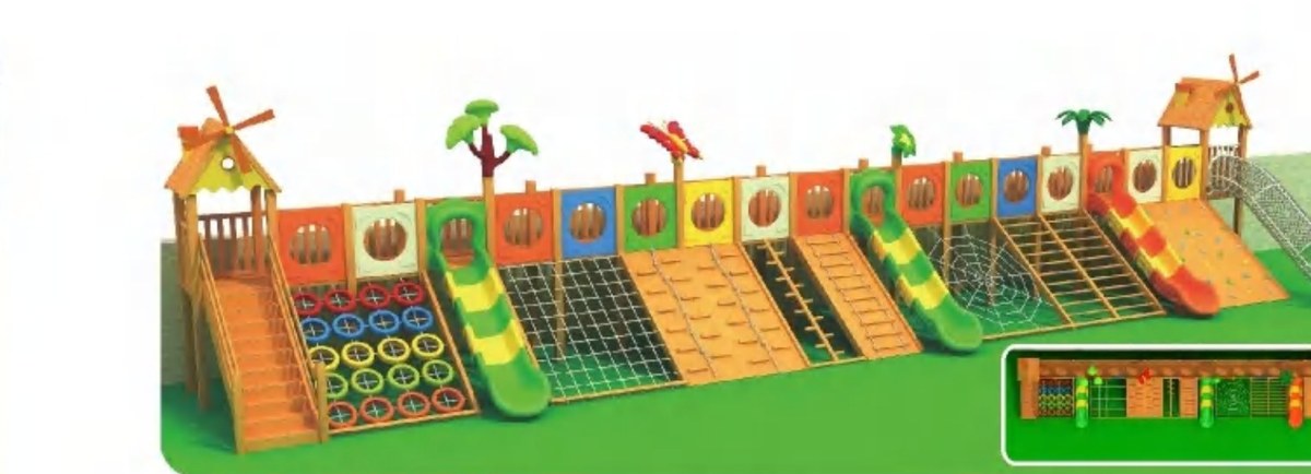 Wooden climbing wall with slides set in green landscape